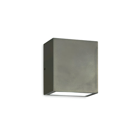 A minimalist, square-shaped outdoor LED wall light named "Glaera Outdoor LED Wall Light 6W 3000K - Grey" is mounted against a white background. The sleek, modern design features an IP65 rating with a concealed bulb that emits a 3000K warm light from the bottom edge.