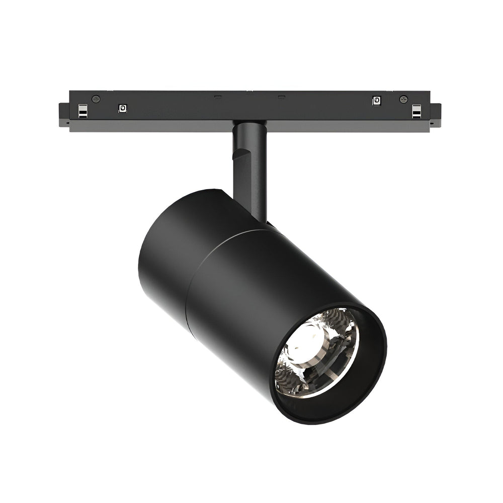 The Luxeon Dimmable LED Magnetic Track Spotlight 26W 4000K in black features a sleek, modern cylindrical design with magnetic mounting on a linear rail. This dimmable spotlight is angled to highlight its reflective interior and bulb, making it perfect for contemporary interiors that benefit from focused LED lighting.
