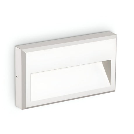 The Arcana-1 LED Outdoor Wall Light 6W 4000K in white is a minimalist rectangular fixture that features a cutout section for illumination, delivering energy-efficient brightness. With its clean lines and modern design, it mounts seamlessly against a plain white background.