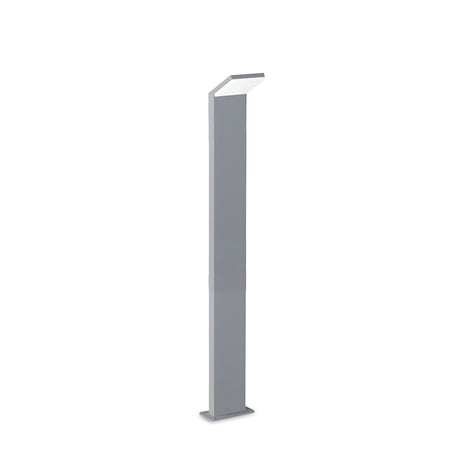 The Brillix Outdoor LED Bollard Light in grey features a sleek, modern design with a 100cm tall rectangular base and a slightly angled top, offering energy-efficient lighting at 3000K.