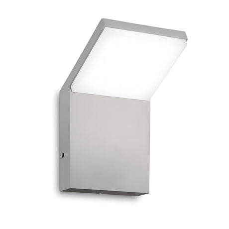The Brillix Outdoor LED Wall Light 9W 4000K showcases a sleek, contemporary design with a square base and an angled, flat rectangular light panel. This grey fixture provides energy-saving illumination with its modern, minimalist style.
