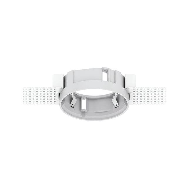 The Glistenis Trimless Round Frame for Downlight 98mm in white offers a modern aesthetic with its plastic mounting bracket and two perforated flaps extending from opposite sides. The design features a circular central section, several internal clips, and a hinged component on top, making it ideal for seamlessly securing downlights.