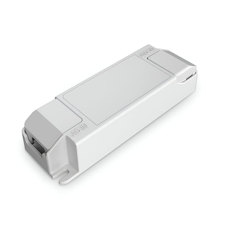 Set against a plain white background, the sleek rectangular Glistenis Constant Current LED Driver - 21W, 350mA features a white plastic design with raised ends and a smooth surface. The sides are clearly labeled "AC IN" and "DC OUT," guaranteeing a steady current of 350mA for optimal performance.