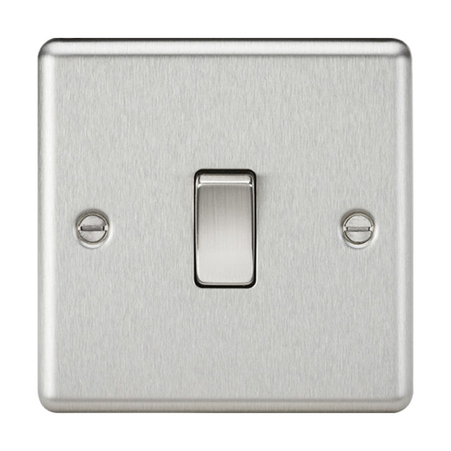 A 10AX 1 Gang Intermediate Switch with a brushed chrome finish on a rounded edge plate, featuring a silver metal light switch and two visible screws, one on each side, in the off position.