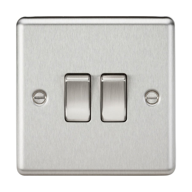 The 10AX 2 Gang 2-Way Switch - Brushed Chrome (Rounded Edge) is a stainless steel double light switch with a brushed chrome finish. It features two toggle switches and includes two securing screws on either side, displayed against a plain white background.