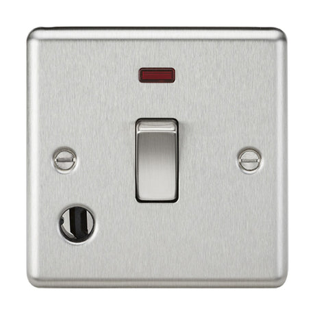 A 20A single gang double pole switch with a brushed chrome finish features a toggle in the center and a neon indicator above it. The rounded edge design with two screw holes provides a sleek and modern touch to any room.