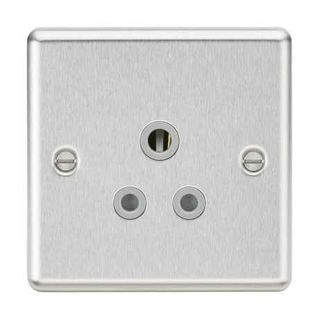 The 5A Unswitched Socket - Brushed Chrome Finish (Grey Insert) is a silver metal electrical wall socket with a 5A round pin design, featuring three circular holes in a triangular formation. It boasts two screws for mounting and smooth, slightly rounded edges that contribute to its elegant appearance.