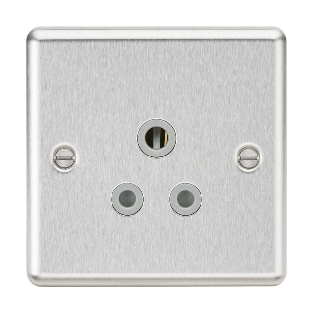 The 5A Unswitched Socket - Brushed Chrome Finish (Grey Insert) is a silver metal electrical wall socket with a 5A round pin design, featuring three circular holes in a triangular formation. It boasts two screws for mounting and smooth, slightly rounded edges that contribute to its elegant appearance.