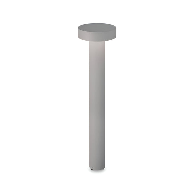 The Gloara Outdoor Bollard Light - Grey, 80cm is a sleek and modern outdoor lighting fixture featuring a cylindrical metal base with a round, flat top. It provides gentle illumination ideal for pathways and gardens, while its minimalist design boasts a smooth gray finish that seamlessly complements any landscape.
