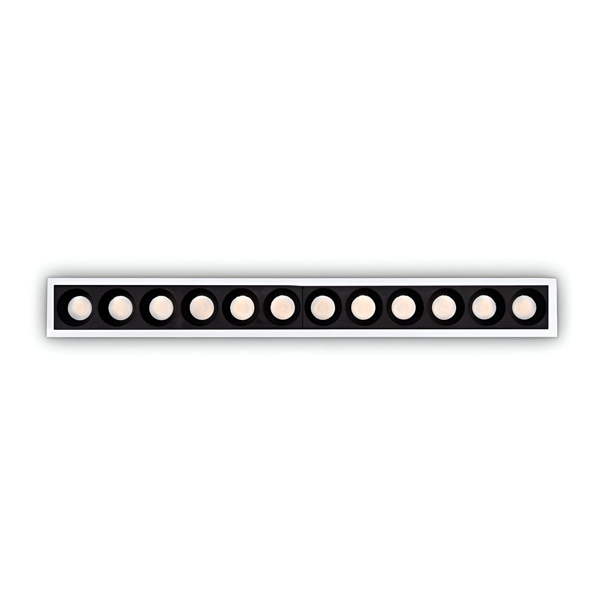 The Phosix Slim LED Recessed Downlight, a sleek white fixture equipped with 10W power and emitting a warm 3000K glow, blends modern style with energy-efficient lighting through its circular lights softly illuminating the space against a contrasting black background.
