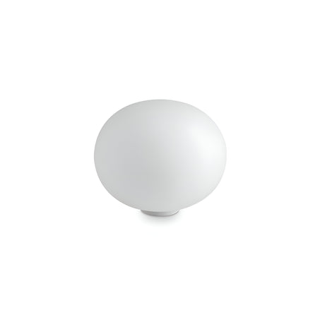 A white spherical Orlix Large Table Lamp, made from acid-etched blown glass, sits elegantly against a plain background. Its modern and minimalistic design effortlessly complements both contemporary and traditional interiors.
