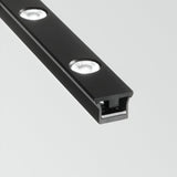 A close-up of the Viora Magnetic LED Linear Track Lighting in black showcases its sleek design with three round, dimmable 6W LED lights embedded along its length, making it ideal for modern interiors. Set against a plain white background, this piece exemplifies the elegance of magnetic LED lighting.