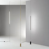 Essence Round Floor to Ceiling Lamp - Brass in situ