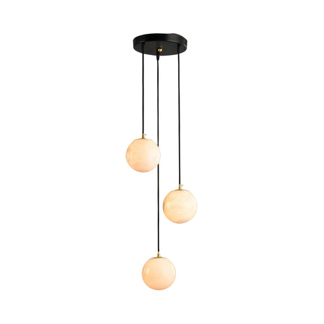 The Lyvane 3 Light Globe Alabaster Cluster Pendant Light features three soft white alabaster globes suspended at varying heights from a round matte black ceiling mount.