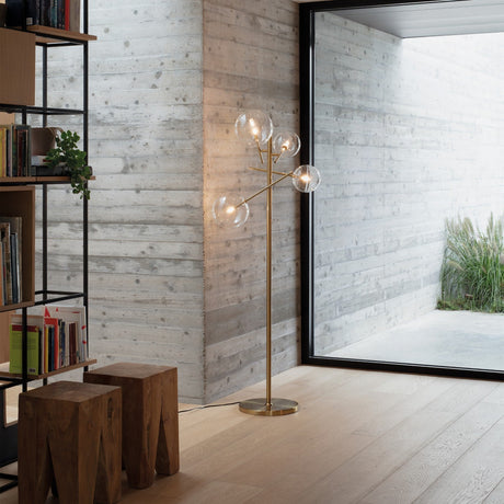 Equinoxe Floor Lamp - Antique Brass & Amber Glass in situ