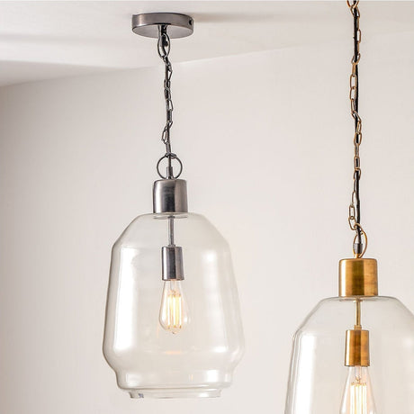 Fia Clear Glass & Black Nickel Chain Drop Pendant Light, 28cm, with clear glass shade and exposed bulb suspended on a black nickel chain, shown against a white ceiling and wall.