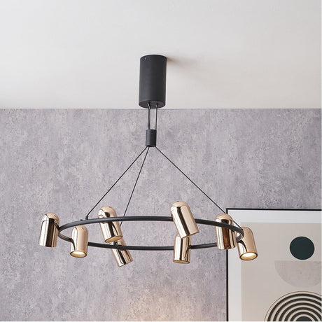 Xena Black & Rose Gold Iron 8 Light LED Pendant, 79cm wheel design with rose gold cylindrical shades on a black frame, shown suspended from a black ceiling mount.