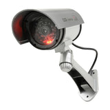 Mercury dummy IR bullet CCTV camera by AVSL in silver plastic with flashing red LED, mock cable and adjustable wall bracket on a white background.
