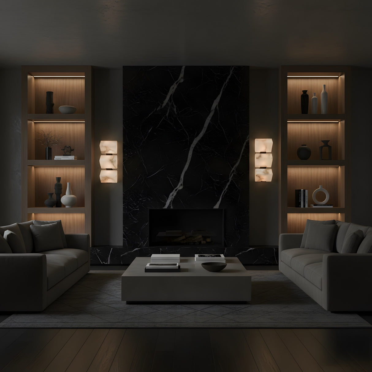 A modern living room features a dark marble fireplace, built-in shelves with soft lighting, beige sofas, a rectangular coffee table, and neutral accessories. The Glorina LED Large Stacked Alabaster Wall Light adds elegance to the minimalist aesthetic.