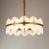 Niori Petraia 6 light chandelier with white alabaster petal panels in two staggered rings around a brushed brass band, hung from a gold fabric cable.