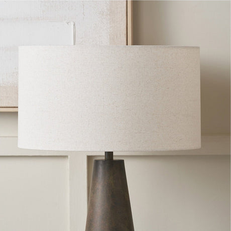 Quinn Slubby Hopsack Cylinder Shade in natural jute-textured fabric, 45cm wide, fitted to a table lamp with a tapered bronze base in a home setting.
