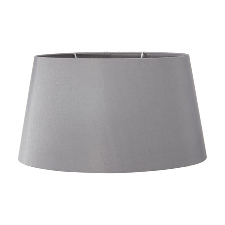 Martha Steel Grey Oval Silk Mix Tapered Lampshade, 25cm, in grey fabric with a wider base tapering to a narrower top, shown on a plain white background.
