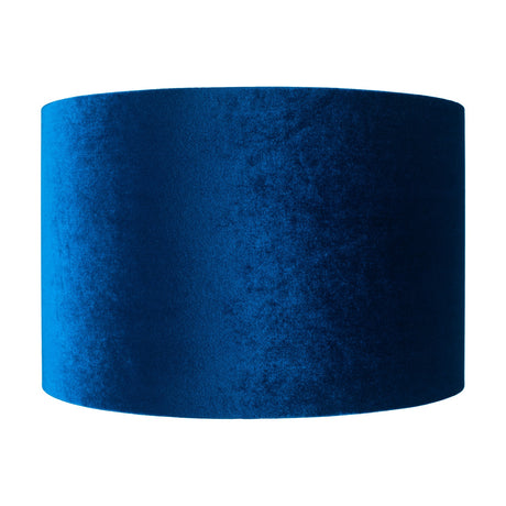 Bow Sapphire Velvet Cylinder Lampshade, 25cm wide, in blue velvet with a smooth drum shape, shown against a plain white background.