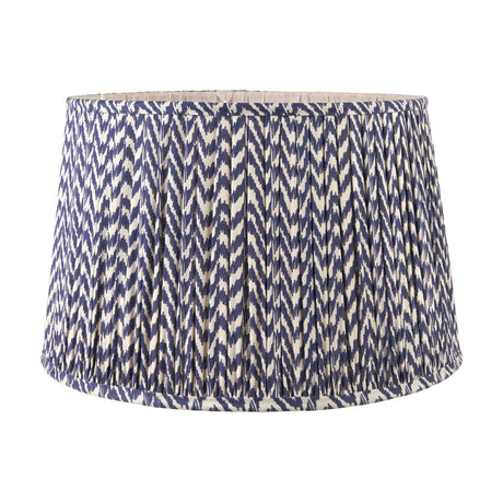 Vienna Blue Chevron Pleated Lampshade, 50cm, tapered drum shape in navy and cream fabric with pleated sides, shown on a plain white background.