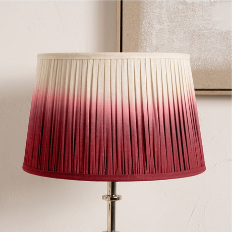 Scallop Red Ombre Soft Pleated Tapered Lampshade, 20cm, fabric drum shade in cream-to-red ombre, shown on a chrome table lamp base against a neutral wall.