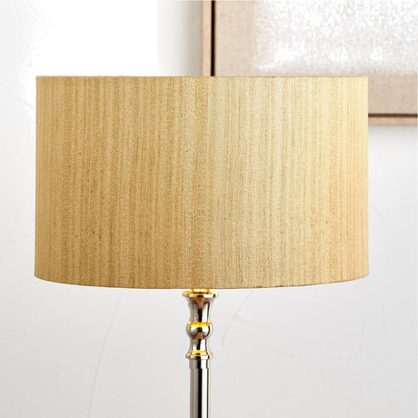 Stellan Gold Slubbed Silk Mix Lined Cylinder Lampshade, 45cm, shown fitted on a chrome floor lamp base against a plain white background.