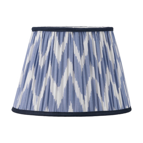 Kamilah Blue Chevron Pleated Tapered Lamp Shade, 30cm, in fabric with a zigzag pattern and navy trim, shown on a plain white background.