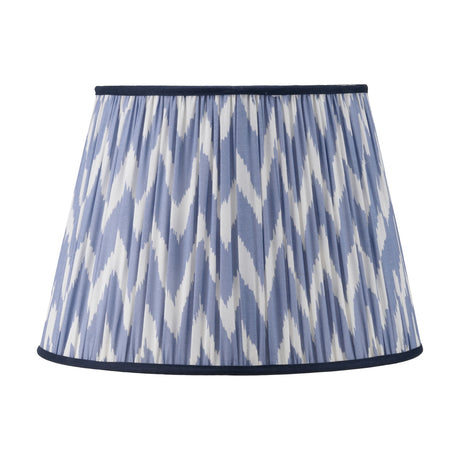 Kamilah Blue Chevron Pleated Tapered Lampshade, 45cm, in blue and white zigzag fabric with navy trim, shown on a plain white background.