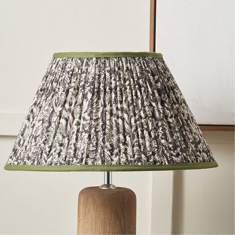 Ornella Green Floral Design Pleated Empire Lamp Shade, 40cm, pleated fabric with green trim on a wooden lamp base, shown against a plain light background.