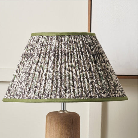 Ornella Green Floral Design Pleated Empire Lamp Shade, 45cm, in green and cream fabric with green trim, shown on a wooden lamp base against a plain background.