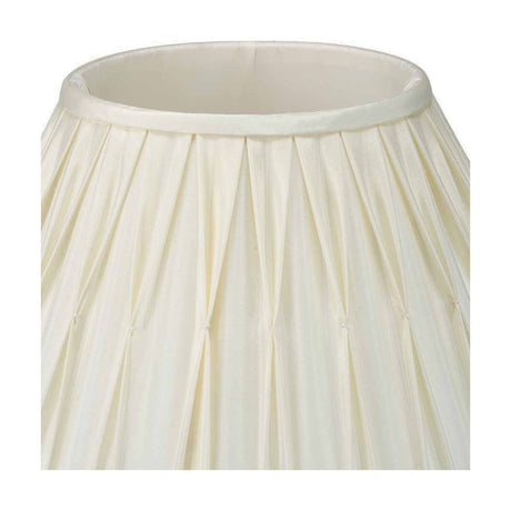 Close-up of the Garbo Cream Silk Mix Pinch Pleated Tapered Lampshade, 25cm, showing pinch-pleated fabric texture and finished top trim on a white background.