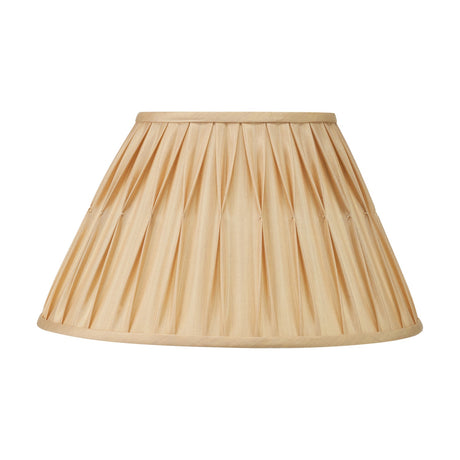 Garbo Gold Silk Mix Pinch Pleated Tapered Lampshade, 25cm, with gathered fabric pleats and a tapered silhouette, shown on a plain white background.