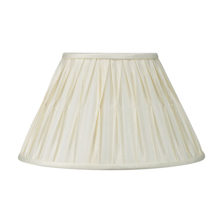 Garbo tapered lampshade in cream silk mix with pinch-pleated sides and a matching trim, 40cm wide, shown on a plain white background.