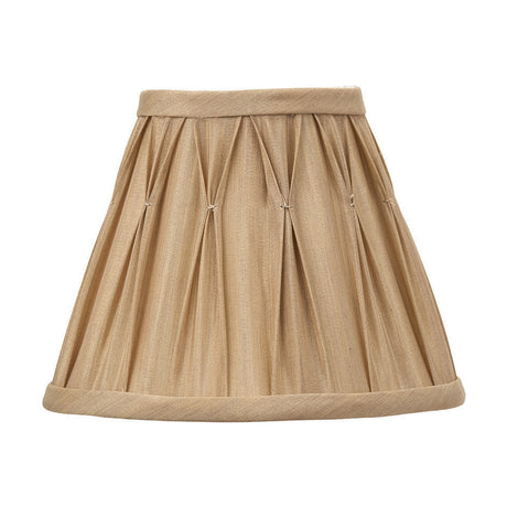 Garbo Gold Silk Mix Pinch Pleated Tapered Lampshade, 20cm, in a gold fabric with pleated sides and pinched detailing, shown on a plain white background.