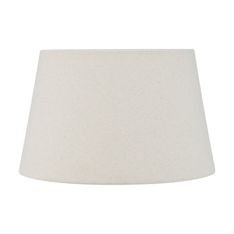 Coast Cream Calico Tapered Lampshade, 25cm wide, in a textured cream linen finish, shown on a plain white background.