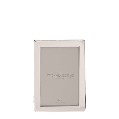Rectangular flat edge photo frame in silverplated metal with a broad smooth border, holding a 4x6in print, shown upright on a plain white background.