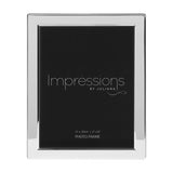 Rectangular silverplated metal photo frame with a flat polished border, holding an 8 x 6in portrait photo, shown on a plain white background.