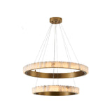 The Lucenza LED 2 Tier Halo Ring Alabaster Chandelier in Brushed Brass & Soft White features circular rings suspended by slim wires, each with an alabaster diffuser for a sleek, modern look.