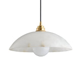 The Faylen 1 Light Bowl Alabaster Single Pendant Light in Soft White & Brushed Brass features a dome-shaped Spanish alabaster shade, a round white bulb, and is suspended from a black cord against a white background.