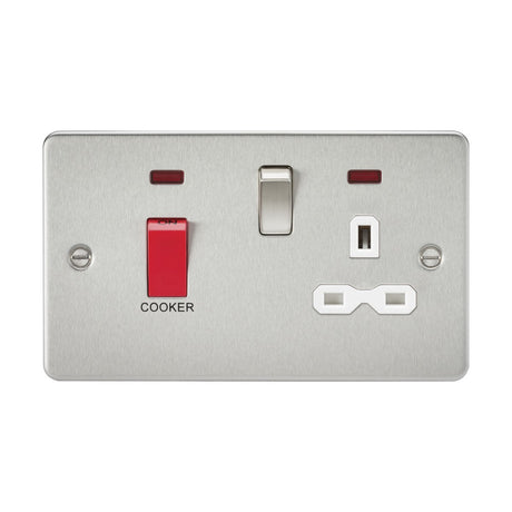 This flat plate electrical wall plate in a brushed chrome finish, featuring the 45A DP Switch & 13A Socket Neons with a grey insert, includes a cooker control unit with a red toggle switch neatly labeled "COOKER," an additional switch, and a double socket outlet.