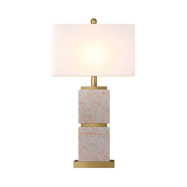 The Veradex 1 Light Marble Block Table Lamp features a brass finish, a white cylindrical shade, and two stacked blocks in purple marble—a modern and elegant accent for any room.