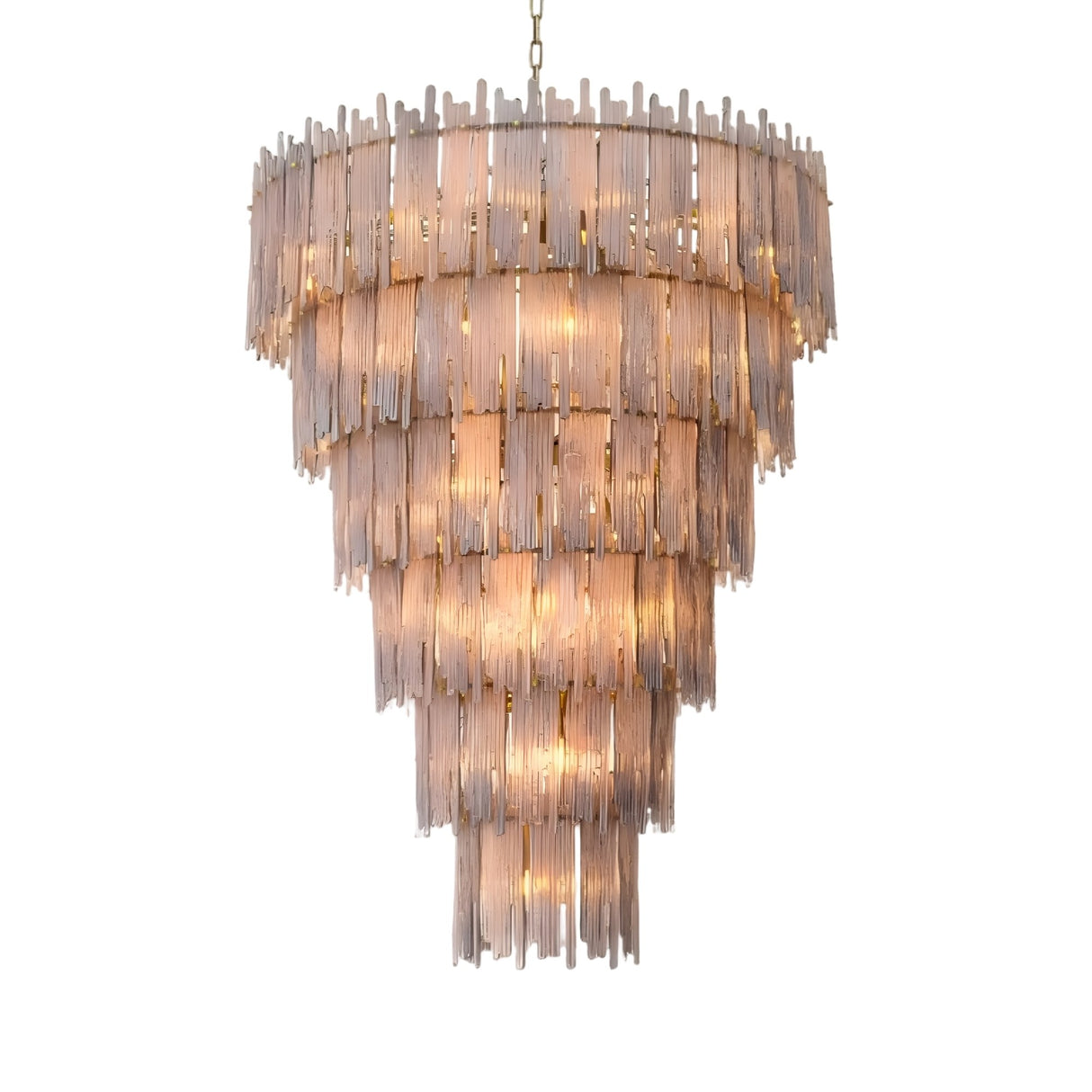 The Velyra 38 Light Tiered Prism Glass Chandelier in Brushed Bronze features multiple layers of vertical glass prisms, glowing with warm light as it hangs elegantly from a chain against a plain white background.