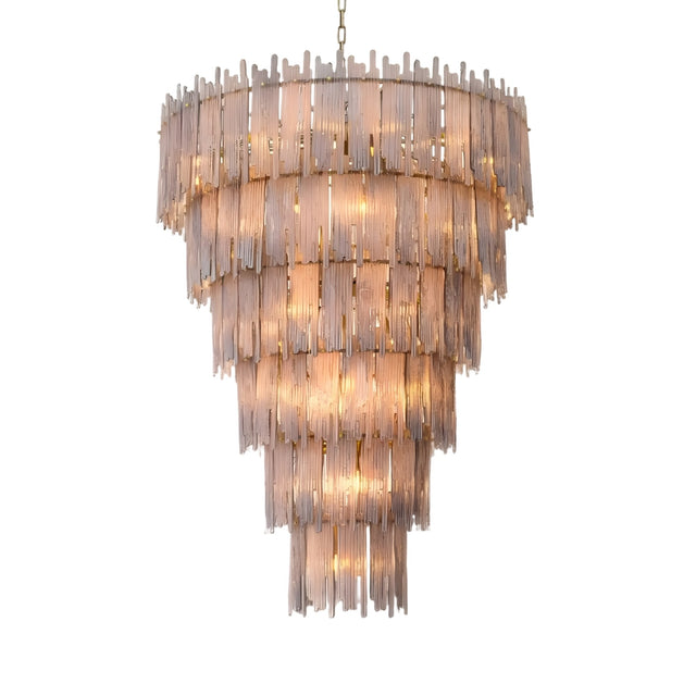 The Velyra 38 Light Tiered Prism Glass Chandelier in Brushed Bronze features multiple layers of vertical glass prisms, glowing with warm light as it hangs elegantly from a chain against a plain white background.
