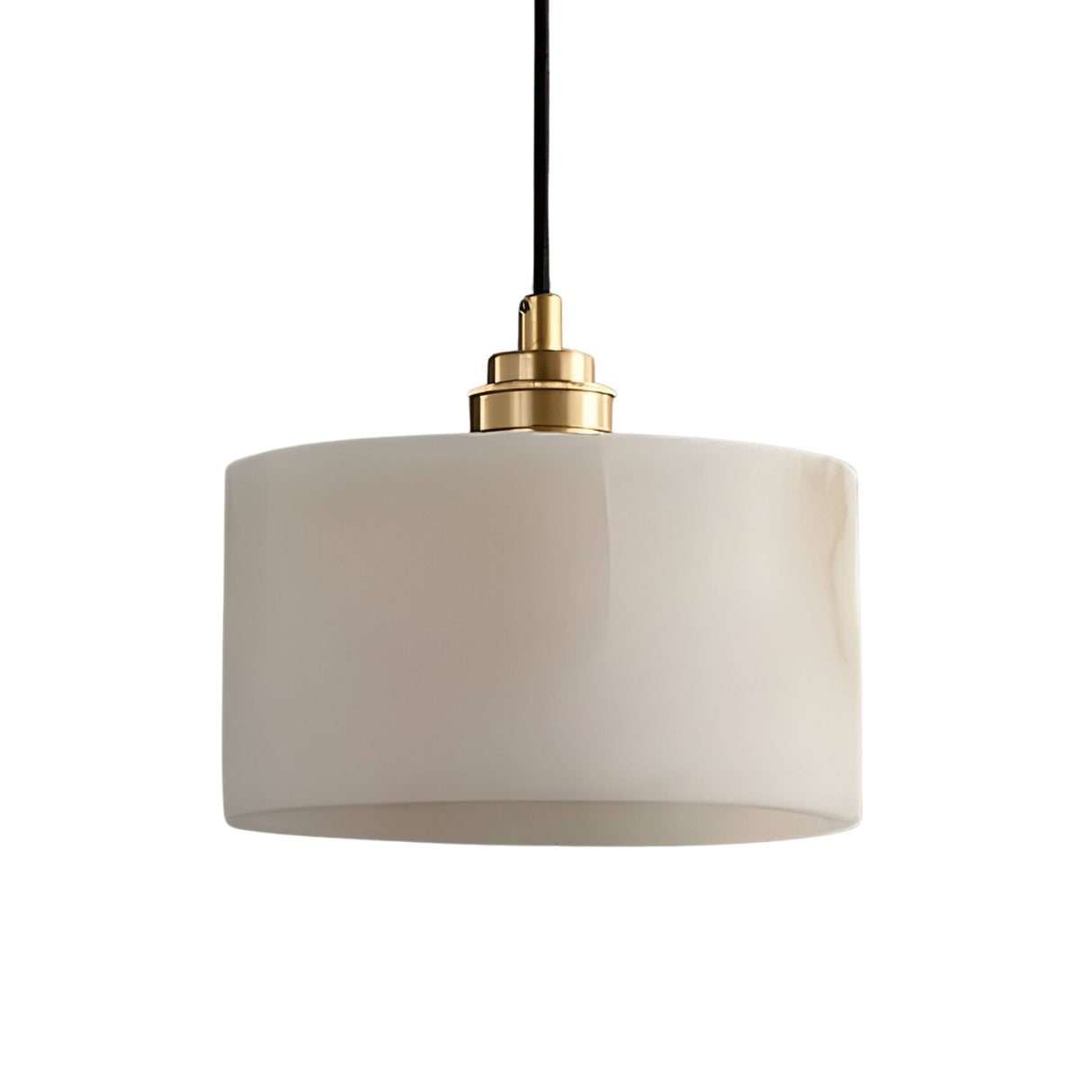 The Brinex 1 Light Alabaster Single Pendant Light features a cylindrical, soft white opaque shade with a brushed brass fixture, suspended by a black cord against a plain white background.