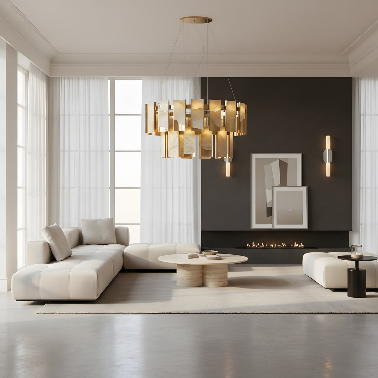 A modern living room with white sofas, round coffee tables, a black accent wall with a minimalist fireplace, abstract art, floor-to-ceiling windows, sheer curtains, and a gold chandelier. The Aurelian LED Double Column Alabaster Wall Light adds subtle elegance.