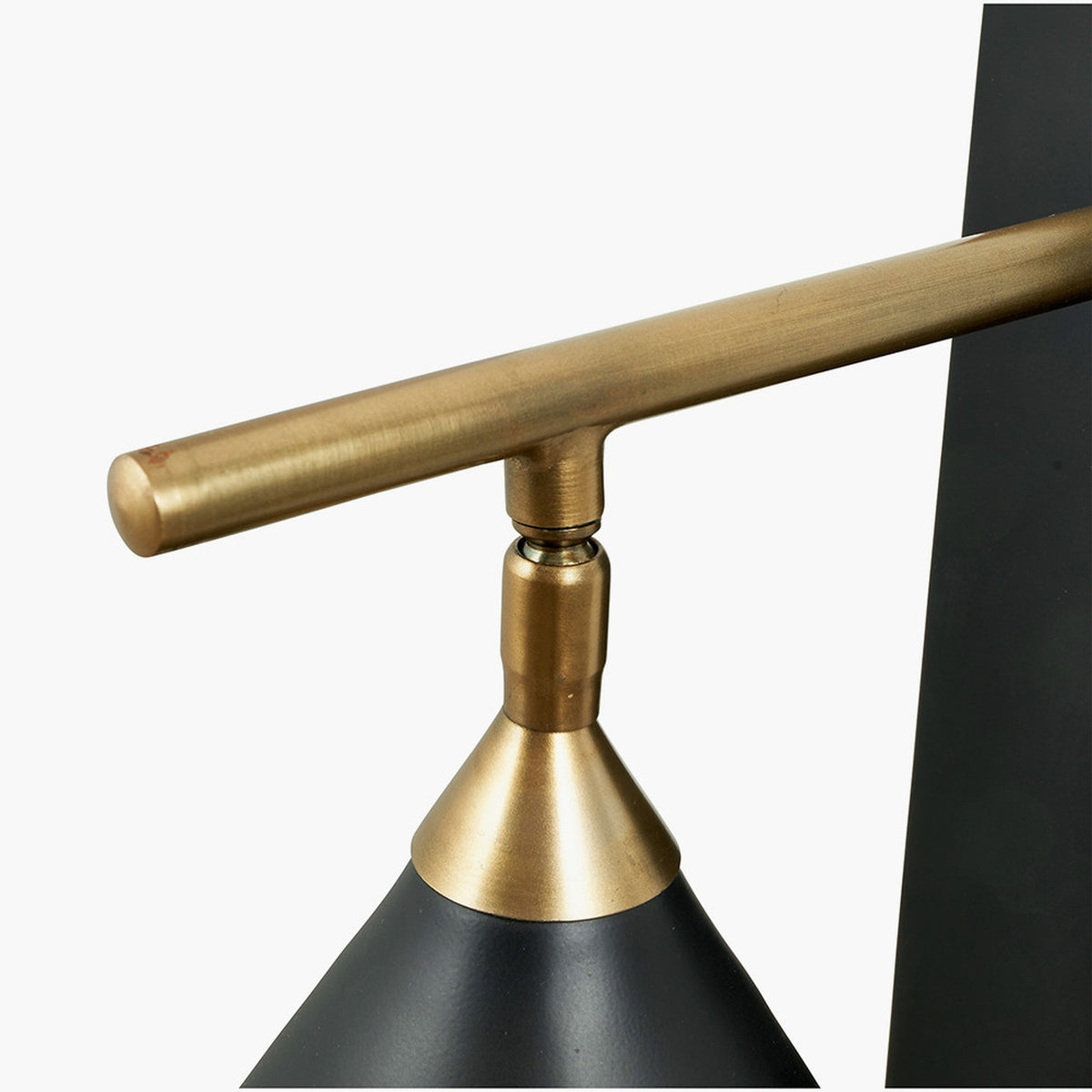 Zeta Matt Black & Antique Brass Wall Light - 31cm, close-up of the horizontal brass bar arm and conical matt black shade with brass collar, shown against a plain background.